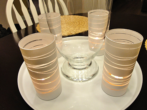 spray paint rubber band candle holders