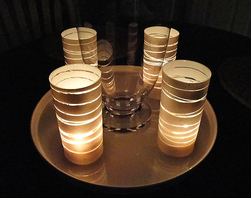 spray paint rubber band candle holders